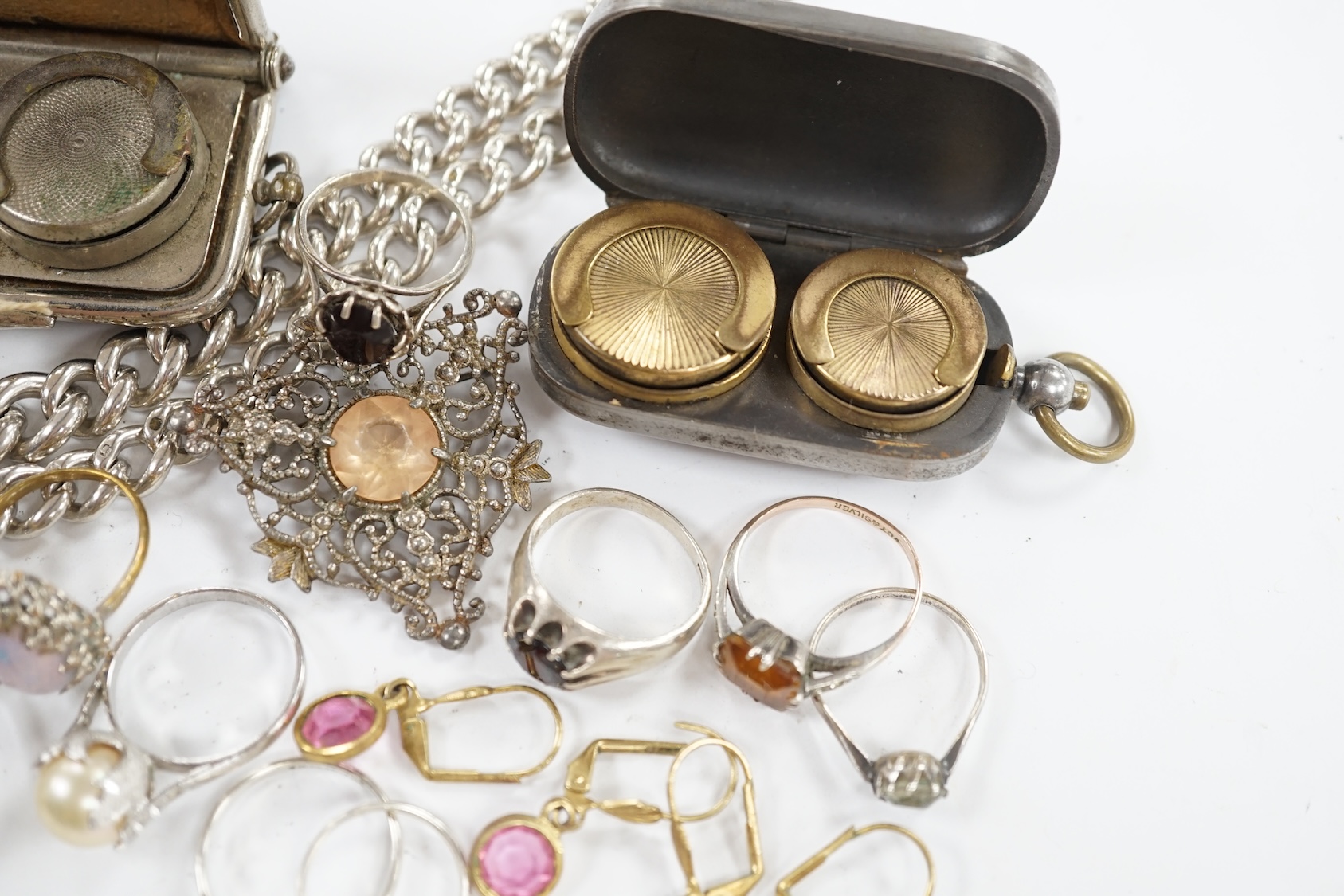 A silver graduated curb link albert, 41cm, two base metal sovereign cases and a small collection of assorted jewellery including silver and white metal rings. Condition - poor to fair to good